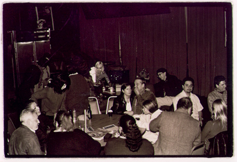 Patrons at Mr. T's in Highland Park listen to the Peek Show during the Dog Rescue Benefit Nov. 2, 2001