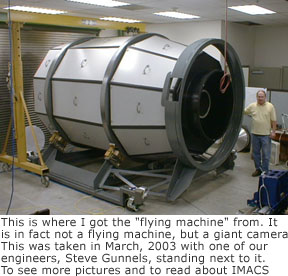 Steve Gunnels standing next to IMACS at Carnegie Observatories in March, 2003.
